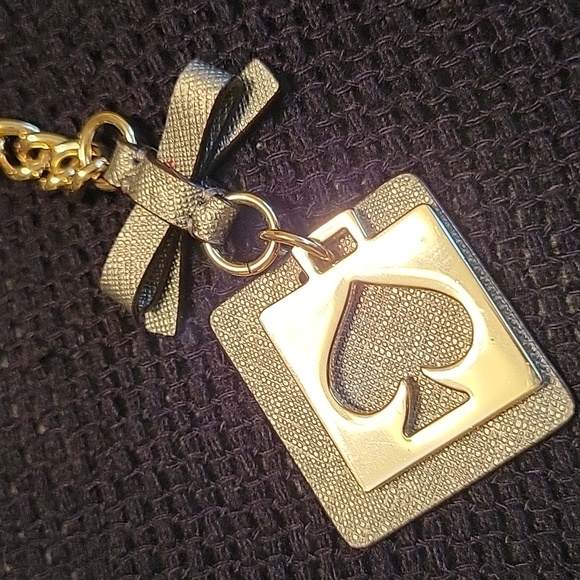 kate spade Handbags - Kate Spade key ring/bag charm with Spade & cute bow